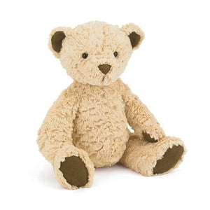 Angled View: Adorable Jellycat Edward Bear, tilted with curiosity, showcasing soft fur, a cute mocha nose, and button eyes.
