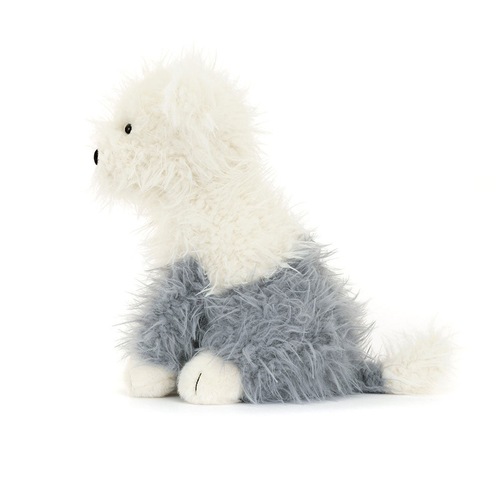 Side view of Jellycat Ewert Sheepdog sitting upright with flopsy ears.