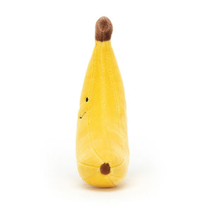 Fun and fruity! The Jellycat Fabulous Fruit Banana boasts a dapper stalk, soft fur, and a playful design, perfect for cuddles and giggles. (Side view)