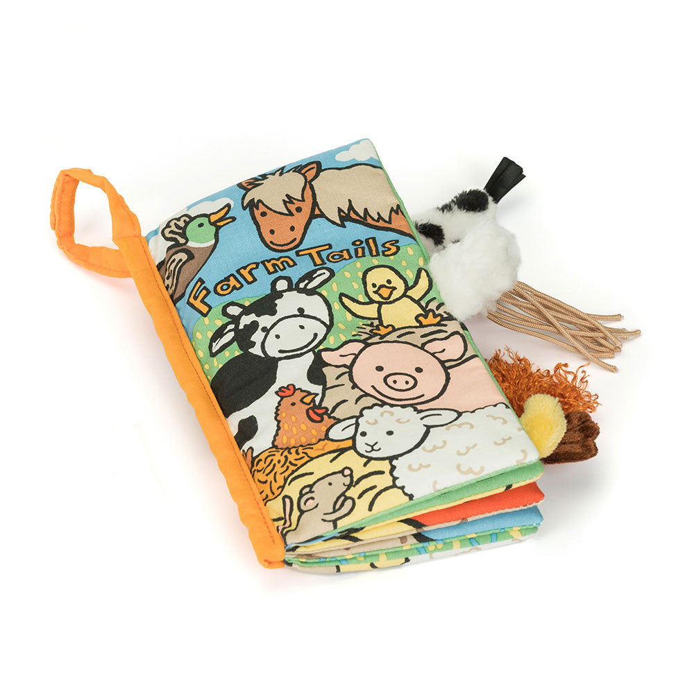 Angled view of Jellycat Farm Tails book showing multiple tactile animal tails.