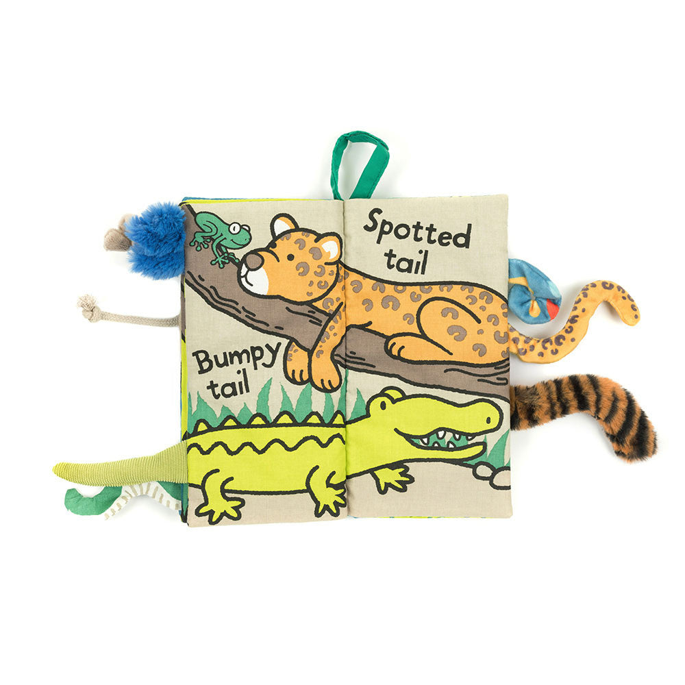 Open pages of Jungly Tails book featuring leopard and crocodile with “Spotted tail” and “Bumpy tail” text.