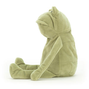 A side view of Jellycat Fergus Frog, with his legs outstretched and his long arms by his side.
