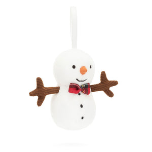 Jellycat Festive Folly Snowman  (angled view): Cream snowman with tartan bowtie, coal buttons & carrot nose. White ribbon attached to hang the snowman up.