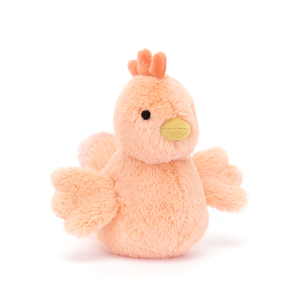 Angled View: Jellycat Fluffy Chicken plush toy, soft apricot chicken with mustard beak.