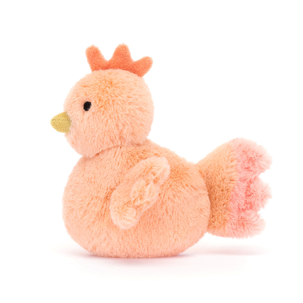 Side View: Jellycat Fluffy Chicken plush toy, soft apricot chicken with mustard beak.