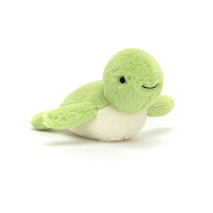 Angled View: A shell-ebration of softness! The Jellycat Fluffy Turtle leans forward, showcasing its fuzzy pompom head, vibrant lime green shell, and leafy flippers. A big, stitched smile adds to the charm. 