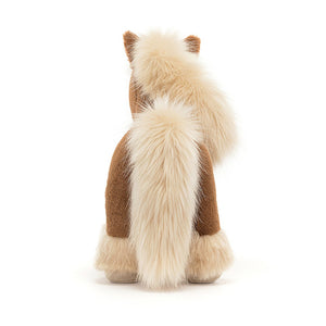 Back:  The back of the Jellycat Freya Pony reveals its soft toffee-colored fur, flowing blonde tail, and a cute little pony rump complete with a fluffy tail and delicate feathery hooves.