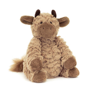 Front view: Jellycat Fuddles Calf plush toy sitting upright with soft brown fur and plush horns.