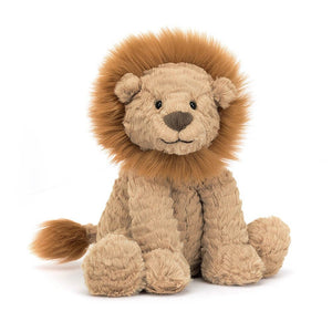 Front: A super soft and cuddly Jellycat Fuddlewuddle Lion with a friendly embroidered face, floppy ears, and a mane of soft brown curls.