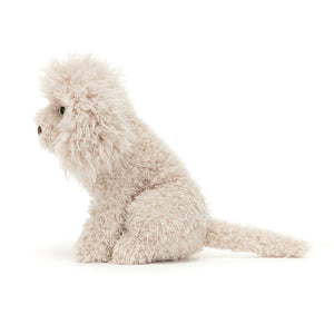 Side: This adorable Jellycat Georgiana Poodle shows off her quirky charm from the side. Her soft fur is delightfully textured, her long ears droop endearingly, and her tail wags with hidden whimsy.