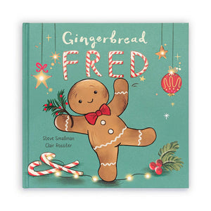 Cover: A colourful board book cover featuring a smiling gingerbread man standing in front of a bakery.