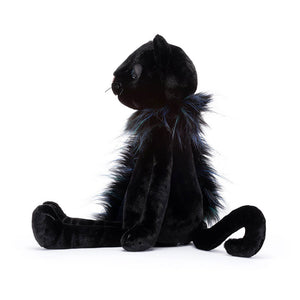 Side view of Jellycat Glamorama Cat highlighting her sparkly accessories and elegant posture.