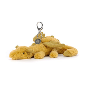 Lucky charm alert! The Jellycat Golden Dragon Bag Charm features shimmering fur, sparkly wings, and a glittery tail for good fortune on the go.