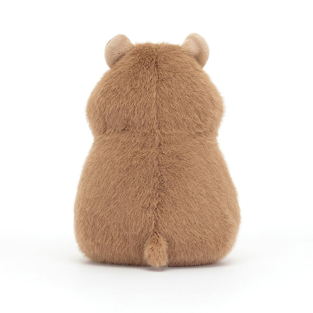 Tailored for cuddles: The back view of Jellycat's Gordy Guinea Pig reveals his soft fur, podgy form, and cute tail. Perfect for cozy snuggles after piggy escapades.