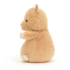 Side View: Side profile of the cuddly Jellycat Hank Hamster. Highlights the compact size (perfect for all ages!), the soft, squishable texture, and the adorable  little features like the ears, feet and paws.