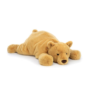 Front: A super soft and cuddly Jellycat Harvey Bear with a sleepy expression, a rumpled tummy, and oversized, weighted paws. His luxuriously soft, golden-brown fur practically begs for hugs.