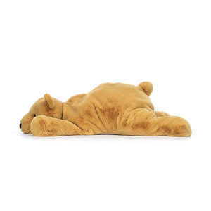Side: This giant Jellycat Harvey Bear shows off his impressive size, luxuriously soft fur with a hint of golden shimmer, and a relaxed profile that screams "cuddle time."