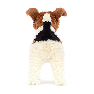 Back: The back of the Jellycat Hector Fox Terrier reveals his luxuriously soft fur with a mix of cream, brown, and ginger. His cute little tail and the details of his perky ears complete his adorable and energetic look.