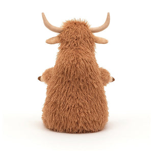 Back: Super soft and cuddly, Herbie the Jellycat Highland Cow is perfect for snuggles! He has a delightful ginger coat and adorable details like cocoa-dipped hooves and suedey horns.