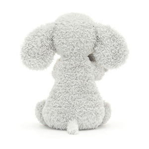 Rear view of Jellycat Huddles Grey Elephant, highlighting the fluffy grey fur, large floppy ears, and a tiny baby elephant nestled closely.