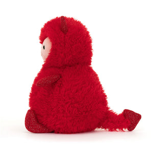 Side View: Jellycat Hugg McSnugg, a cuddly red monster with a generous tummy and a fluffy tail.