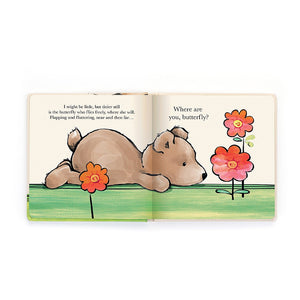 Open Book: The open Jellycat I Might Be Little Book showcases a colorful illustration of a bear and flowers.