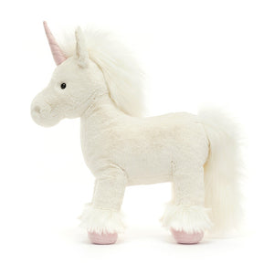 Straight On View: Jellycat Isadora Unicorn displayed straight on, highlighting its majestic presence. The soft clotted-cream fur, flowing mane and tail, and the whimsical pink twist horn with silver stitching create a truly enchanting sight