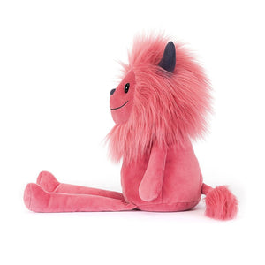 Side: Jinx the Monster, a super soft and cuddly Jellycat plush. She has a bright pink body, a luxuriously fluffy pink mane, and adorable details like blue-grey horns and a stitchy nose.