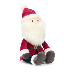 Angled: Jellycat Jolly Santa plush (angled view): Santa with red coat, white beard, green trousers & bobble hat.