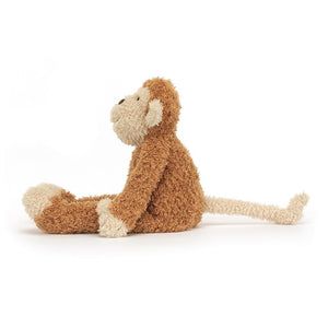 A side view of Jellycat Junglie Monkey showing his big tail.