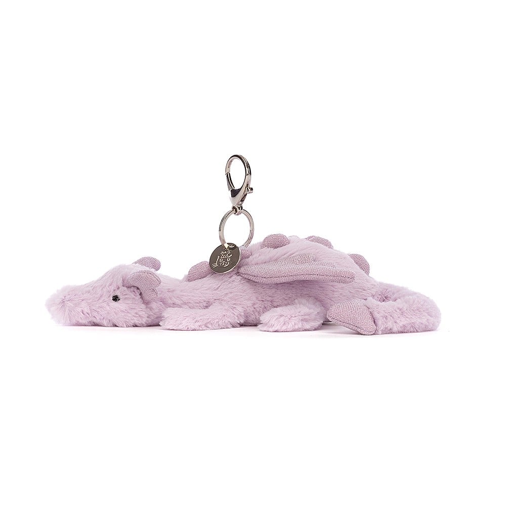 A side view of Jellycat Lavender Dragon Bagcharm.