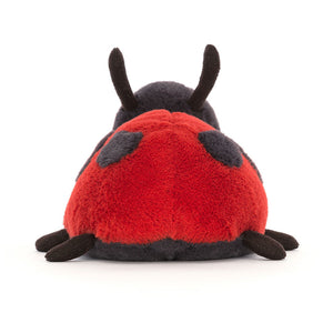 Back view of the Jellycat Layla Ladybird plush toy, emphasizing its playful pose and bright red colour.

















