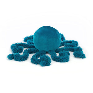 A top-down perspective of Jellycat Letty Jellyfish, displaying its rounded plush body and flowing teal tentacles arranged in a circular pattern.