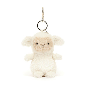 Front view of Jellycat Little Lamb Bag Charm, showcasing its fluffy white fur and sweet lamb face.