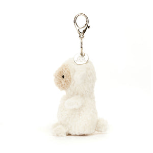 Side view of Jellycat Little Lamb Bag Charm, showing its compact size and cuddly appearance.