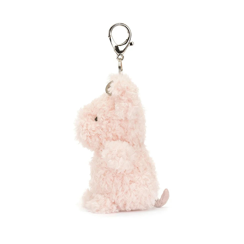 A side view of Jellycat Little Pig Bag Charm showing the silver bag clip.