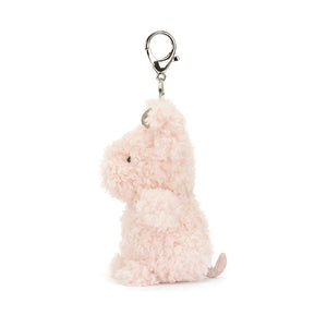 A side view of Jellycat Little Pig Bag Charm showing the silver bag clip.