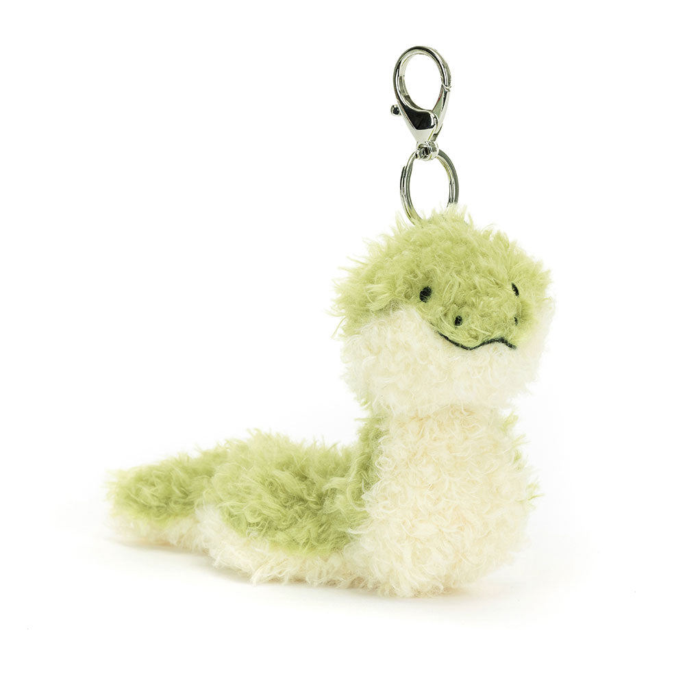 Jellycat Little Snake Bag Charm, angled view, showing its soft green and cream fur and silver claw clip and Jellycat tag to attach to any bag.