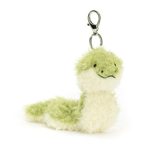 Jellycat Little Snake Bag Charm, angled view, showing its soft green and cream fur and silver claw clip and Jellycat tag to attach to any bag.