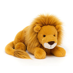 Angled View:  Honey coloured Jellycat Louie Lion plush with a luxurious mane, playfully tilted for a curious look.