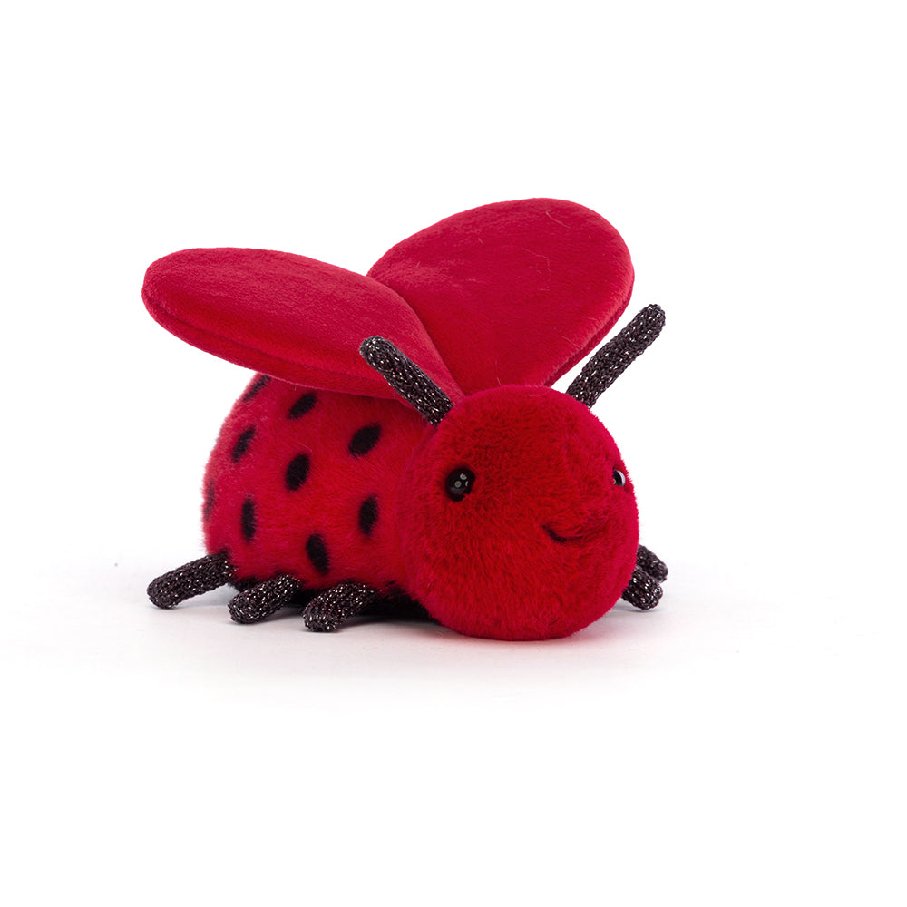 Jellycat Loulou Love Bug plush toy, 
 slightly angled view, red bug with heart-shaped wings and sparkly legs and feelers.