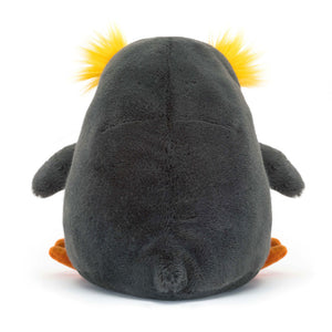 Cuddly Jellycat Maurice Macaroni penguin plush: Back view showing blue-grey fur, yellow tufts & orange feet.