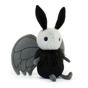 Angled View:  Spark curiosity with Miff Mothman! (21 cm x 18 cm) - A cuddly plush with silky black fur, embroidered wings, fuzzy head & cord antennae. 