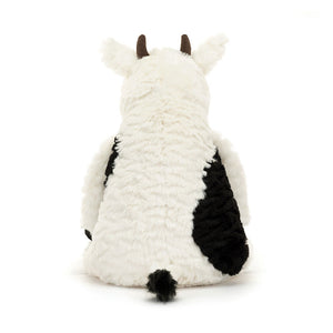 Back view of Jellycat Mooliet Cow, featuring its fluffy tail and textured fur.