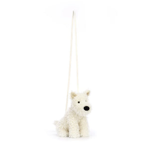 Hanging from Strap: Walk hands-free and turn heads with the adorable Jellycat Munro Scottie Dog Bag! The adjustable crossbody strap ensures comfortable wear for all your adventures.