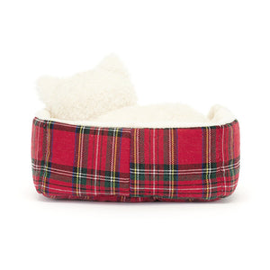 Back View: Jellycat Napping Nipper Westie displayed from behind, showcasing the shortbread fur and the snug comfort of the tartan bed. Perfect for bedtime snuggles!