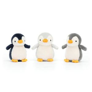 Penguin Party Time! The Jellycat Nesting Penguins are out of their nest, ready for adventures. One in navy fur, one in silver fur and one in grey fur with vanilla tummies and tangerine beaks! 