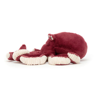 Side profile of the Jellycat Obbie Octopus plush toy, showcasing its detailed tentacles and creamy-cord underarms.