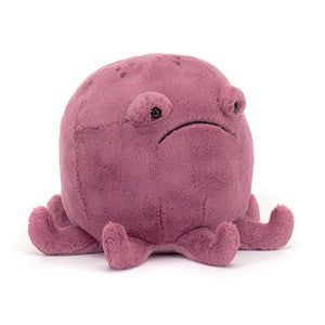 Angled View: Looking for a hug with eight arms? The Jellycat Ondre Octopus leans in, showcasing its chunky aubergine plush with embroidered speckles and tiny, curled arms. Don't be fooled by the stitched frown, this octopus is all cuddles! 