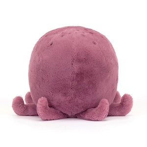 Back View: Backside of the Jellycat Ondre Octopus showcases the soft aubergine fur and eight wiggly arms. This playful octopus adds a touch of undersea fun to any playtime adventure! 